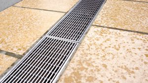 PC-install-Kings-School-Strip-Channel-Drain-680x380